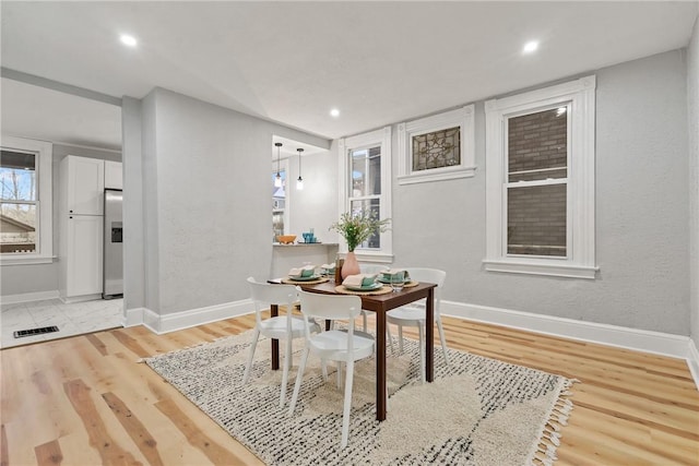 office with light hardwood / wood-style floors