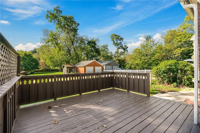 wooden deck featuring a storage unit