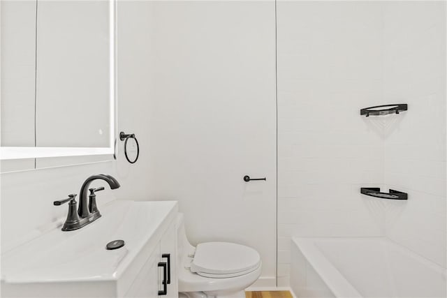 full bathroom with vanity, toilet, and tiled shower / bath combo