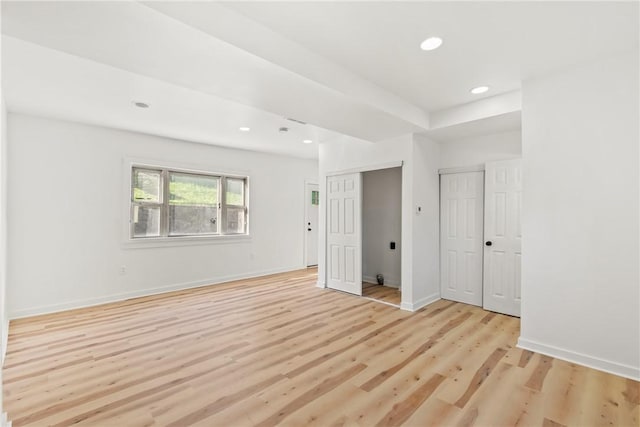 unfurnished room featuring light hardwood / wood-style floors