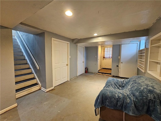 bedroom with concrete floors