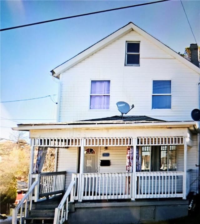 view of front of home featuring covered porch