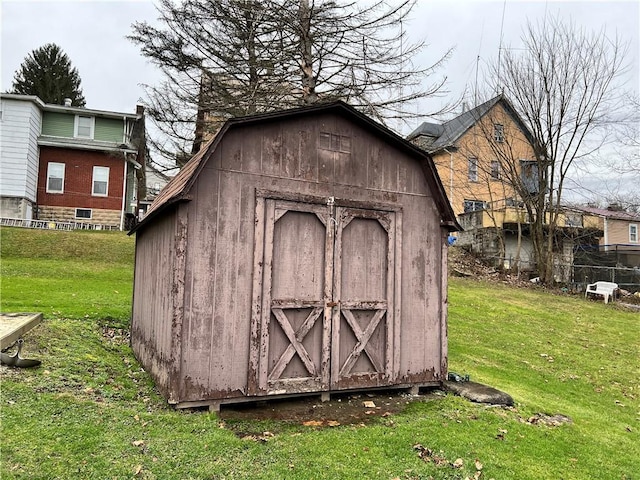 view of outdoor structure with a yard