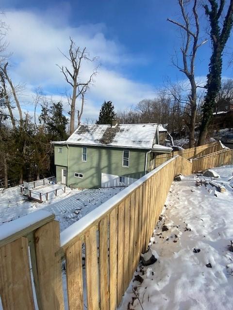 view of snow covered property