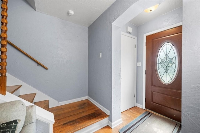 entrance foyer with light wood-type flooring