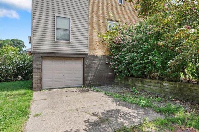 view of side of property featuring a garage