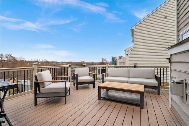 wooden deck with an outdoor hangout area