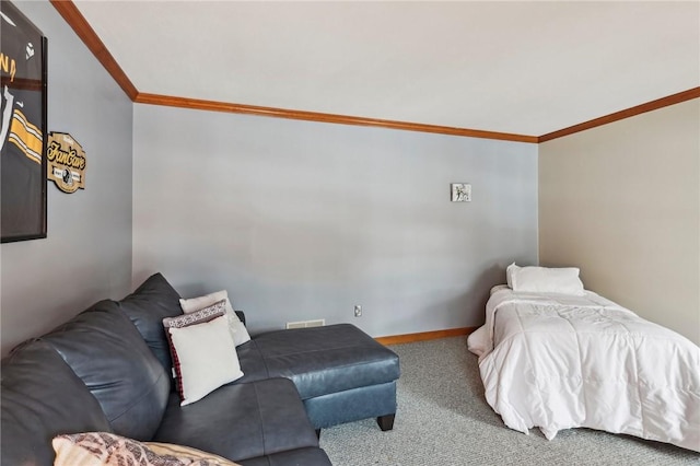 bedroom with carpet flooring and crown molding