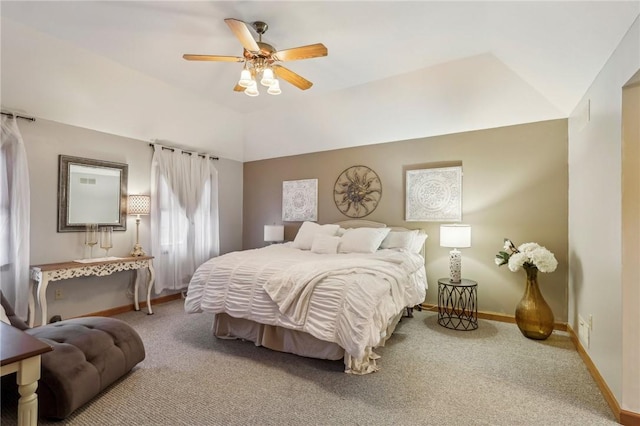 bedroom featuring carpet flooring, ceiling fan, and vaulted ceiling