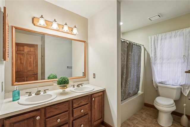 full bathroom with tile patterned flooring, vanity, toilet, and shower / bathtub combination with curtain