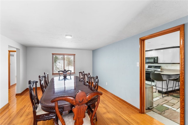 dining area featuring light hardwood / wood-style flooring