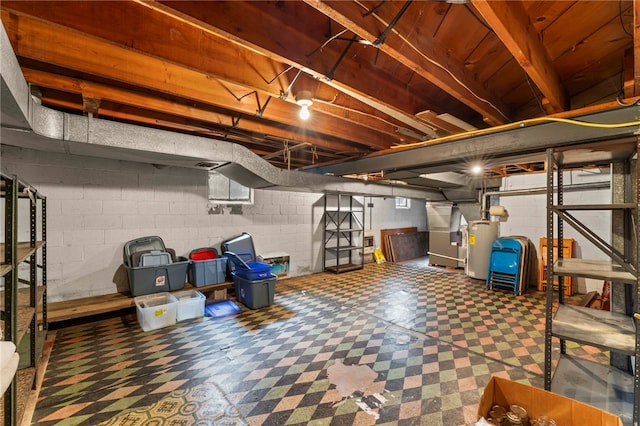 basement with heating unit and gas water heater