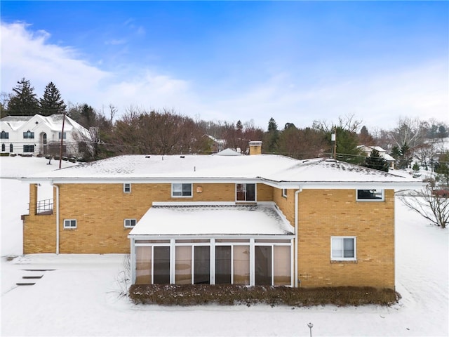 view of snow covered property