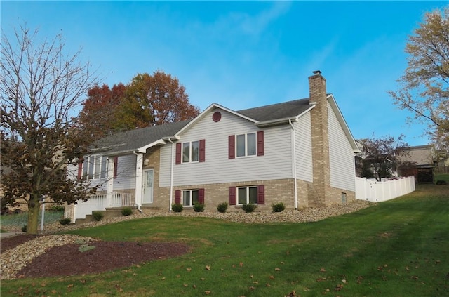 view of front of home with a front lawn