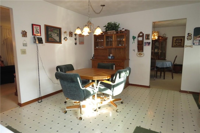 dining area featuring a chandelier