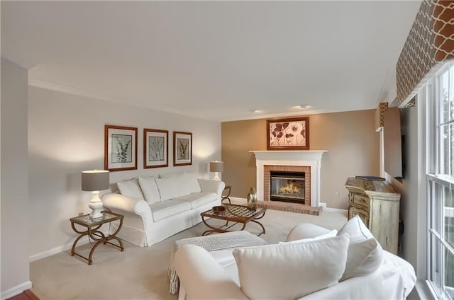 living room with light colored carpet and a brick fireplace