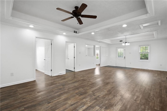 unfurnished living room with a raised ceiling, ceiling fan, and dark hardwood / wood-style floors