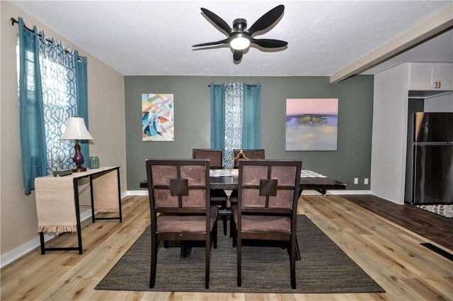 dining room featuring ceiling fan and light wood-type flooring