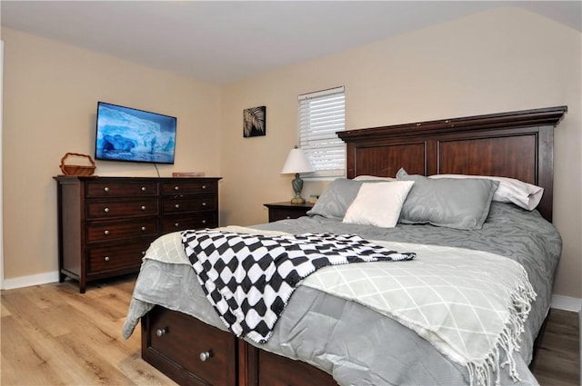 bedroom with light wood-type flooring