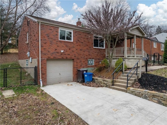 view of front facade with a porch and a garage