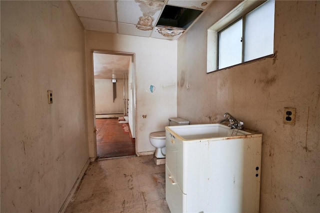 bathroom with toilet and sink