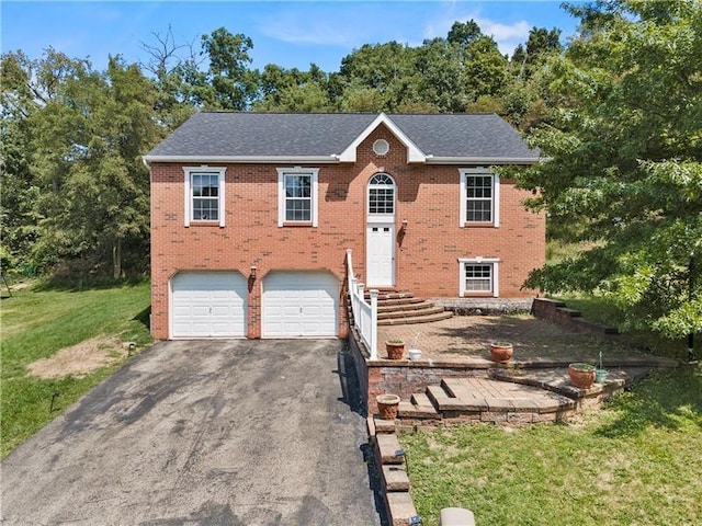 raised ranch featuring a garage