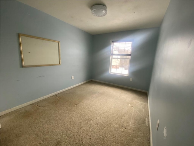 view of carpeted spare room