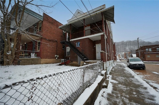 view of snow covered property