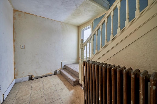 stairway with radiator heating unit