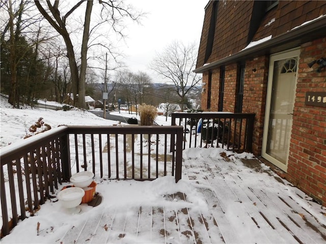 view of snow covered deck