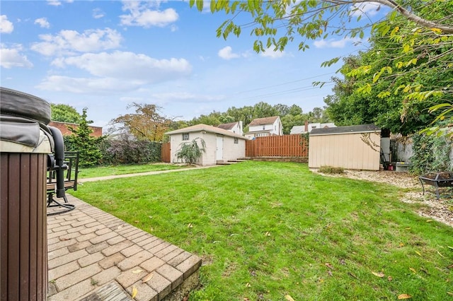 view of yard featuring a storage unit