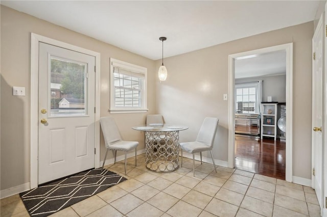 dining space with light tile patterned flooring