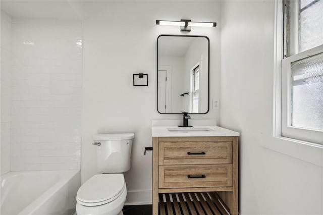 full bathroom with shower / bathing tub combination, vanity, and toilet