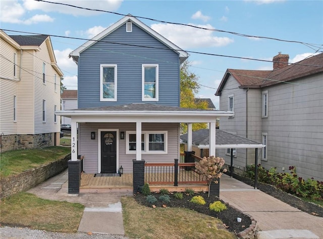 view of front of home featuring a porch and a front lawn