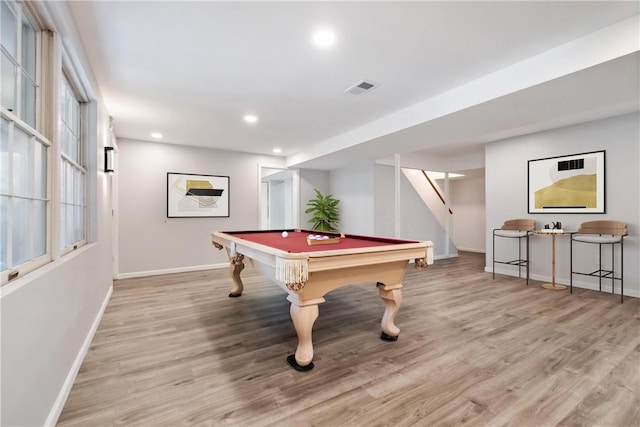 rec room with light hardwood / wood-style flooring and billiards