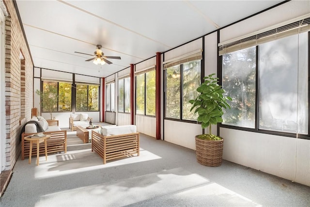 sunroom / solarium with ceiling fan and a healthy amount of sunlight