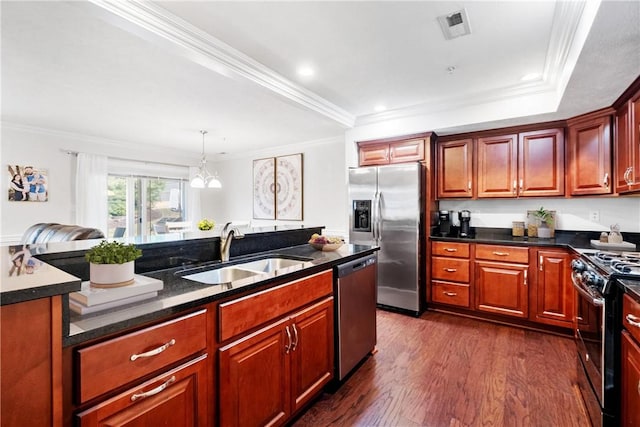 kitchen with crown molding, sink, and stainless steel appliances