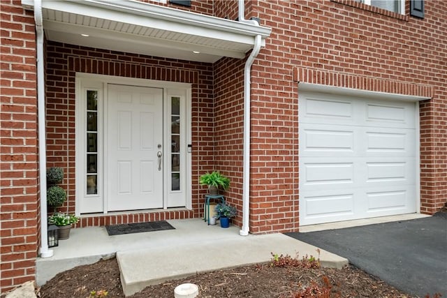 property entrance featuring a garage