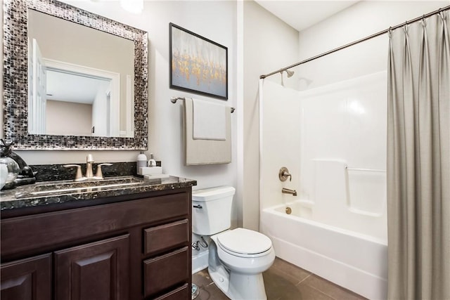 full bathroom featuring vanity, shower / bath combo, and toilet