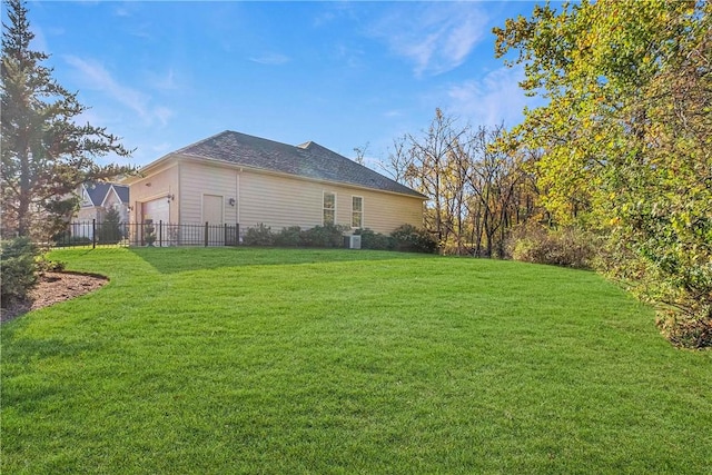 view of yard with a garage