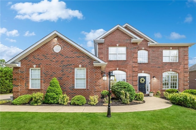 view of front of home with a front lawn