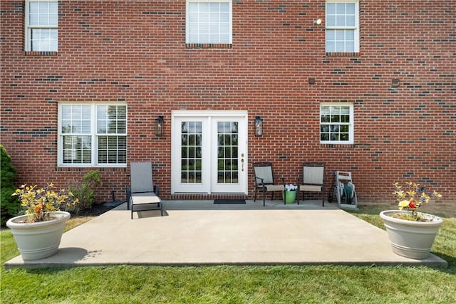 back of property with a patio