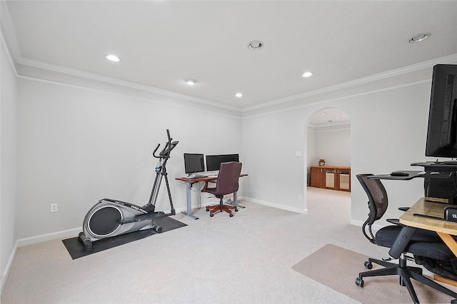 carpeted office space featuring ornamental molding