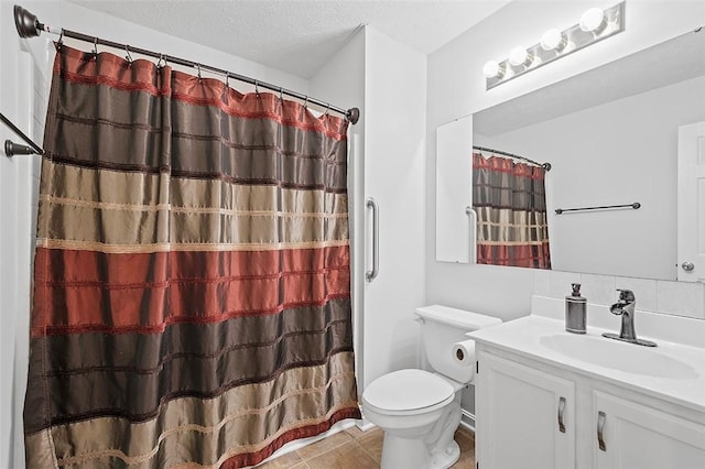 bathroom featuring vanity, tile patterned flooring, a shower with shower curtain, toilet, and a textured ceiling