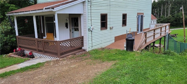 view of property exterior with a lawn