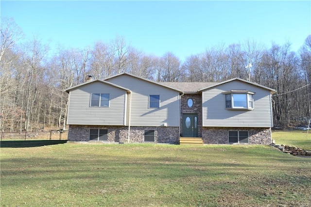 bi-level home with a front yard