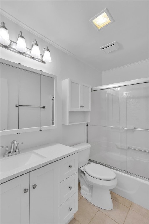 full bathroom with tile patterned floors, vanity, toilet, ornamental molding, and combined bath / shower with glass door