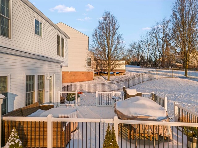 view of snow covered deck