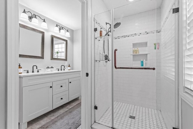 bathroom featuring vanity and walk in shower