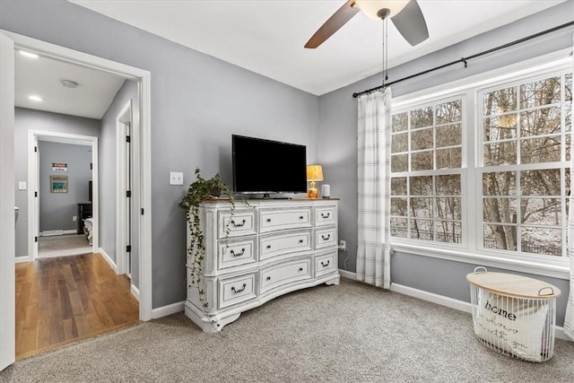 bedroom featuring ceiling fan and carpet floors